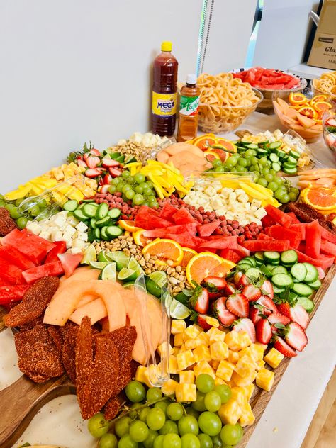 Chamoy Fruit Platter, Mexican Charcuterie Table Ideas, Mexico Charcuterie Board, Fruit Tables For Quinceanera, Charcuterie Mexican Board Ideas, Mexican Fruit Charcuterie Board, Mexican Fruit Platter Ideas, Chamoy Fountain Bar, Charcuterie Board Mexican Theme