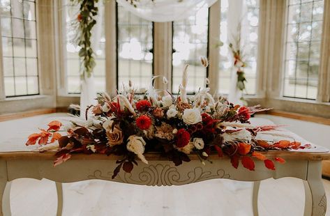 Ceremony Table Flowers Burnt Orange Wedding Sian Hall Photography #wedding #weddingflowers Boho Burnt Orange Wedding, Top Table Flowers, Ceremony Table, Burnt Orange Wedding, Burnt Orange Top, Orange Wedding Flowers, Burnt Orange Weddings, Fleur Orange, Floral Wedding Cake