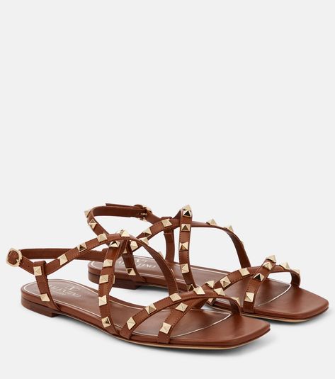 Rockstud leather sandals in brown - Valentino Garavani | Mytheresa Valentino Rockstud Flats, Rockstud Flats, Valentino Sneakers, Valentino Sandals, Latest Sandal, Valentino Garavani Shoes, Leather Sandals Flat, Brown Leather Sandals, Valentino Rockstud