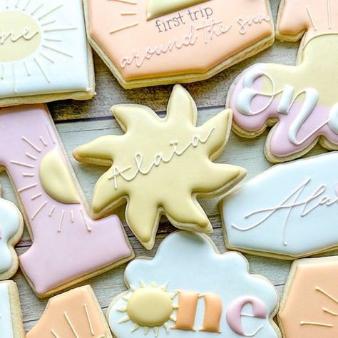 Emily’s Bake Shop on Instagram: "Alaïa’s first trip around the sun ☀️ such a sweet theme for a first birthday in the summer! • • #emilysbakeshop #customcookies #decoratedcookies #sugarcookiedecorating #sugarcookiemarketing #njbaker #njcookies #suncookies #firsttriparoundthesuncookies #sunshinecookies #firstbirthdaycookies" Sunshine Cookies, First Birthday Cookies, Bake Shop, Custom Cookies, Sugar Cookies Decorated, Cookie Decorating, First Birthdays, Sugar Cookie, Baking