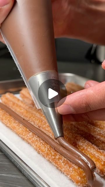 Cedrik Lorenzen on Instagram: "Valentine’s Special: Keeping her wet for more. #valentinespecial#churrosgourmet#forher 

Here, we have beautiful churro sticks finished with Nutella and icing sugar. With Nutella, you can skip the whole chocolate sauce aspect. What I also love about these is that they are simple to make and easy to cook. It can also be made in advance. The trick for a good shape is to semi or fully-freeze them. Recipe instructions are below.

Before you begin: 
1. Dress to impress, stay classy, and respect consent. 
2. If you don’t have the budget, there is no need to go overboard with flowers (it’s the thought that counts, amigo).
3. For more tips, check my recipe site.

Serves 2 (12 -15 sticks at 20-22 cm (+-) depending on your final nozzle tip and preferred length)
Difficu Churro Shapes, Chocolate Nutella, Icing Sugar, Chocolate Sauce, Valentine Special, Stay Classy, Nutella, The Heat, Dress To Impress