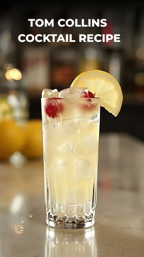 Indulge in the refreshing taste of a classic Tom Collins cocktail with this easy-to-follow Tom Collins recipe. This iconic gin-based drink is perfect for any occasion - whether you're hosting a summer soiree or simply unwinding after a long day. With its citrusy and bubbly goodness, the Tom Collins cocktail is sure to become your go-to favorite. Mix up this delightful concoction and treat yourself to a moment of pure bliss. Tom Collins Recipe Gin, Gin Drinks Easy Classic Cocktails, Tom Collins Recipe Vodka, Vodka Collins Recipe, Drinks With Gin, Tom Collins Drink, Tom Collins Drink Recipes, Gin Collins, Tom Collins Recipe