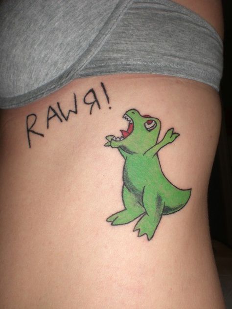 Dinosaur cartoon tattoo, I would get a cute "reptar" tat. Because I grew up watching rugrats Rawr Tattoo, Cartoon Tattoos Ideas, Weird Places, Cartoon Tattoo, Dinosaur Tattoos, Cartoon Tattoos, Cute Fonts, Tattoos For Kids, Beautiful Body