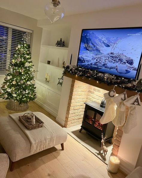 Abbie Jayne on Instagram: "December nights ❄️🎄✨🫶 . . . . . #christmasdecor #christmastree #christmaslivingroomdecor #cosychristmas #christmas2022 #neutralchristmasdecor #brickfireplace #livingroomrenovation #garland #cosylivingroom #livingroomideas #alcoveshelving #alcovecabinets #alcovecupboards #shelfdecor #shelfstyling #neutralsofa #oakfloor #egyptiancotton #duluxegyptiancotton" Log Burner Living Room, Log Burner Fireplace, Alcove Cabinets, Cosy Fireplace, December Nights, Neutral Sofa, New House Living Room, Living Room Renovation, Neutral Christmas Decor