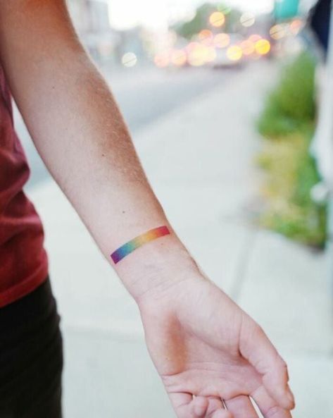 Love simple lines? These minimalist tattoo ideas include everything from airplanes and dinosaurs to aliens to inspire your next one. #tattoos #tattooideas #minimalism Equality Tattoos, Lgbt Tattoo, Rainbow Tattoo, Simple Flower Tattoo, Pride Tattoo, Rainbow Spectrum, Rainbow Tattoos, Ring Finger Tattoos, Palm Tattoos