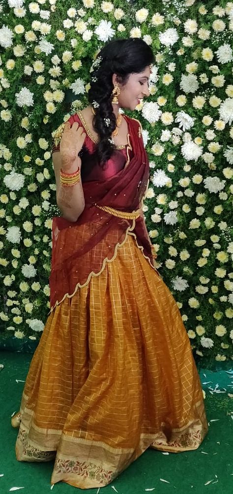 #south_indian #half_saree #hairstyle #bangles #gold_waistband #gold_ornaments #non_bridal #open_smile #maroon_love #dusky_makeup #sharp_makeup #traditional_look #open_smile #voni #mehendi_love #floral_decorations Half Saree Hairstyles, Dusky Makeup, Maroon Half Saree, Sharp Makeup, Saree Hairstyle, Makeup Traditional, Maroon Hairstyles, Saree Hairstyles, Half Sarees