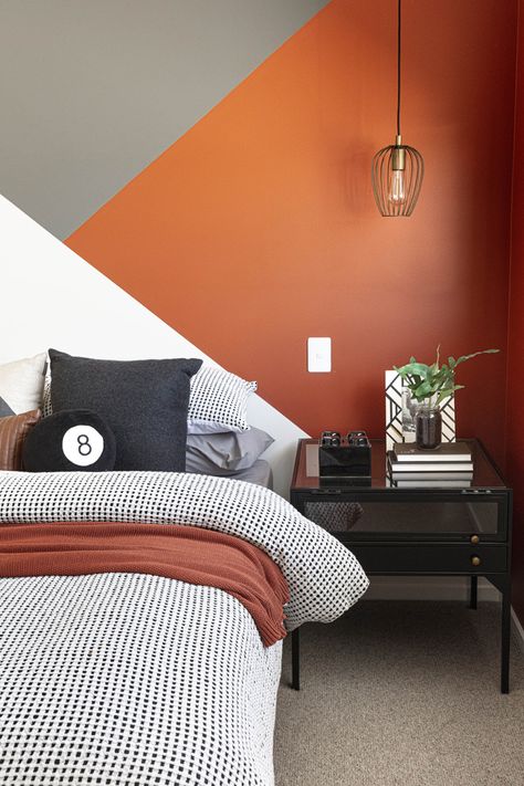 Bedroom - Grayson 30 - Brighton Homes Orange Walls Bedroom Ideas, Orange Wall Paint Ideas Bedroom, Orange Feature Wall Bedroom, Boys Orange Bedroom Ideas, Orange Feature Wall Living Room, Orange Painted Bedroom, Orange Wall Color Living Room, Orange Grey Bedroom, Colorful Boys Bedroom