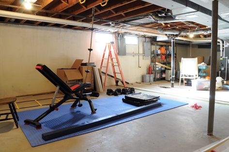 Budget friendly unfinished basement home gym makeover - top tips! Unfinished Basement Gym, Basement Gym And Family Room, Install Can Lights, Dingy Basement, Gym Makeover, Exposed Basement Ceiling, Basement Home Gym, Old Basement, Foyer Flooring