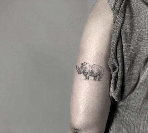 Sketch work rhino tattoo on the tricep. Rhinosaurus Tattoo, Rhino Tattoo Ideas, Tattoo Rhino, Rhino Tattoo Design, Rhino Tattoos, Rhinoceros Tattoo, Rhino Tattoo, African Rhino, Sloth Tattoo