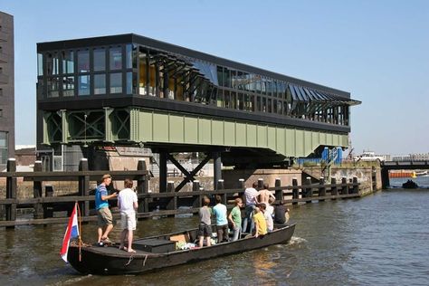 An old railway swing bridge in Amsterdam converted into a restaurant Pay attention to how the windows open Transformable Architecture, Adaptive Architecture, Bridge Restaurant, Railway Bridges, Amsterdam Netherlands, Structural Engineering, Cafe Restaurant, Contemporary Architecture, Interior Spaces