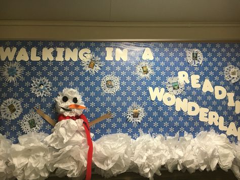 My winter bulletin board. I placed book suggestions in the snowflakes and used tissue paper as snow for a sensory, 3D effect. Snow Bulletin Board, Center Organization, Winter Bulletin Boards, Snow Hill, Fake Snow, Walgreens Photo, Door Decorations Classroom, Classroom Bulletin Boards, Classroom Door