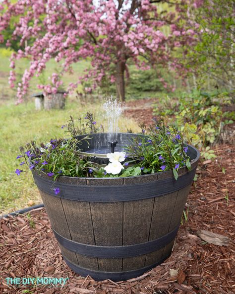 Make a Potting Bench from Pallets & an Antique Window | The DIY Mommy Planter Solar Fountain Diy, Solar Fountain Planter, Diy Camper Kitchen, Solar Water Fountains Outdoor, Diy Wood Stand, Water Fountain Planter, Whiskey Barrel Fountain, Diy Fountain Ideas, Diy Solar Water Fountain