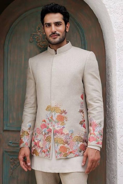 Check out these stunning and fresh tropical-themed outfits for grooms, from pastel bandhgalas to unique floral kurtas. Perfect for your exotic wedding! Beige Bandhgala, Indo Western Men, Indo Western Outfits For Men, Indian Wedding Clothes For Men, Wedding Kurta, Wedding Kurta For Men, Engagement Look, Groom Dress Men, Wedding Outfits For Groom