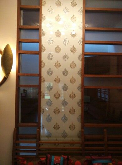 Embroidered fabric between glass on both the sides is a classy idea for partition Cane Partition Interior Design, Sandwich Glass Partition, Fabric Glass Partition, Acrylic Partition, Fabric Partition, Hidden Doors In Walls, Hidden Doors, Fabric Glass, Glass Partition