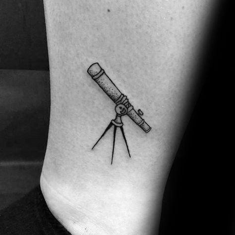 Gentleman With Small Telescope Tattoo On Lower Leg Telescope Tattoo, Hellboy Tattoo, Astronomy Tattoo, Stylish Tattoo, Inspired Tattoos, Space Tattoo, Cool Small Tattoos, Tattoos Gallery, Trendy Tattoos