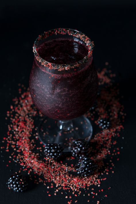 Blackberry Witch's Brew Cocktail — For a truly mysterious margarita, bring on the blackberries! Coat the rim with colored sugar and salt for extra spookiness. Gothic Drinks Cocktail Recipes, Dark Margarita, Goth Drinks, Exterior Halloween Decor, Gothic Cocktails, Witchy Drinks, Gothic Drinks, Witch Brew Recipe, Spooky Drinks