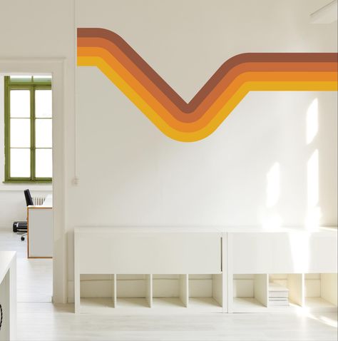 Choose from a range of color and size options to perfectly complement your existing decor. Whether you're creating a retro-themed room or adding a funky accent to your walls, our 70's Inspired Retro Wall Decal will transport you back in time with its vibrant orange and brown hues. Unleash your inner disco spirit and bring a retro flair to your home decor today! {MATERIAL OPTIONS} Peel and Stick Fabric Material--   This type of decal is made from a canvas fabric-like material that allows for effo Wall Decal Line Art, Stripes Tv Wall, Mcm Wall Paint Patterns, 70s Lines On Wall, 70s Stripe Wall, Graphic Wall Design, Retro Accent Wall, Stripe Wall, Living Room Classic