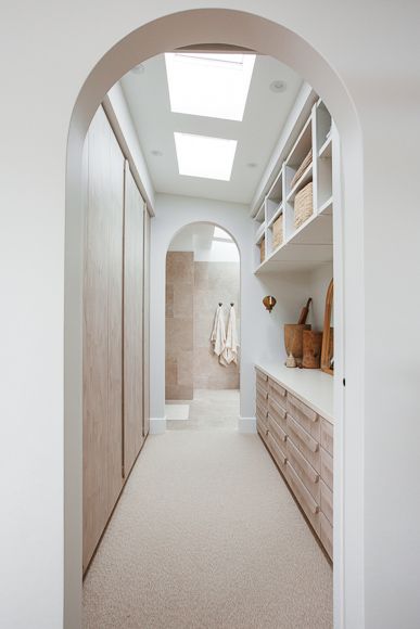 arched doorway leading to walk-through closet // fort & field Arched Doorway, Walk Through Closet, Walk In Closet Design, Dekorasi Kamar Tidur, Bedroom Closet Design, 아파트 인테리어, Closet Design, House Inspo, Dream Home Design