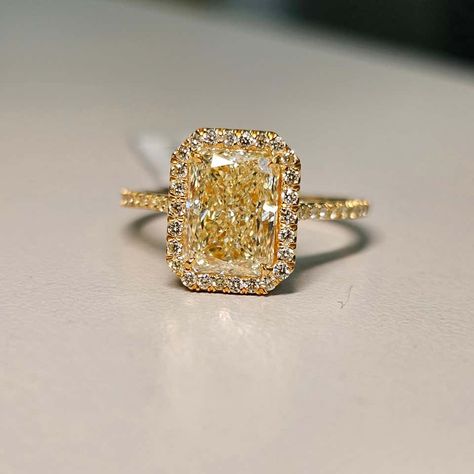 For Sale on 1stDibs - Our classic Yellow on Yellow style radiant diamond engagement ring. A perfectly elongated 2 carat WX colored radiant with a huge spread and amazing life. Engagement Rings With Yellow Stones, Gold Engagement Ring Yellow Diamond, Gold Yellow Diamond Ring, Lab Grown Yellow Diamond, Pink And Yellow Diamond Ring, Yellow Stone Engagement Rings, Yellow Canary Diamond Ring, Colored Diamond Ring, Yellow Diamond Ring Engagement