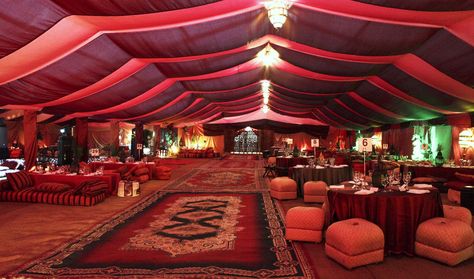 As a couple, you had complete control over the decor and theme of the tent because here are no limits when it comes to decorating a tent. Description from societybride.com. I searched for this on bing.com/images Corporative Events, Dekorasi Maroko, Arabian Nights Wedding, Vegetarian Wedding, Arabian Tent, Arabian Nights Theme, Arabian Wedding, Arabian Nights Party, Bedouin Tent