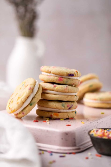 Funfetti Cookie Sandwiches are loaded with rainbow-colored sprinkles and sandwiched with an irresistible light and airy cream cheese frosting. The combination of granulated sugar and brown sugar creates soft and chewy cookies for the perfect bite. Funfetti Cookies, Cookie Sandwiches, Chewy Cookies, Chewy Cookie, Sandwich Cookies, Baking Sheets, Vegetarian Cheese, Cheese Frosting, Cream Cheese Frosting