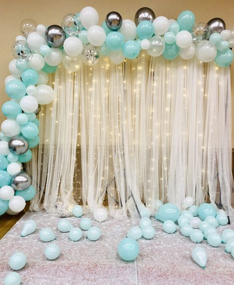 Beautiful elegant teal, white, silver balloon backdrop. Tiffany Blue Sweet Sixteen Backdrop with lights. Sweet 16 Teal And Silver, Turquoise Sweet 16 Decorations, Teal And White Birthday Decorations, Aqua Sweet 16 Decorations, Blue Sweet Sixteen Party Ideas, Tiffany Blue Balloons, Backdrop With Lights And Balloons, Light Blue And Silver Party Decorations, Teal White And Silver Party Decorations