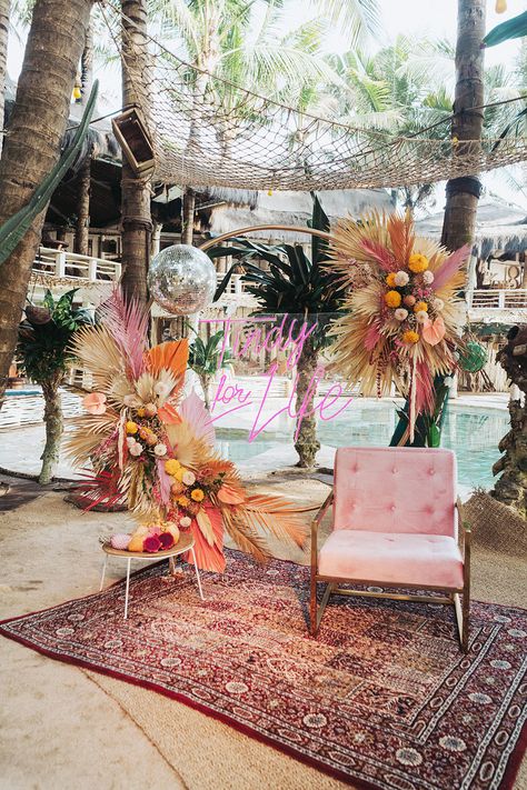 This tropical disco wedding in Canguu, Bali is just what the doctor ordered! An earthy color palette of terra cotta, turmeric, egg shell and peony pink gives life to the nuanced design elements of this 3-Day destination wedding from the abstract Matisse inspired welcome signage and triangular ceremony backdrop to the pampas grass and palm filled floral designs and the rattan chandeliers over the al fresco dinner. We cannot get enough of their unique love story too! Star-crossed lovers from oppos Tropical Disco Wedding, Ideas Para Boda, Tropical Disco, Flower Wall Rental, Welcome Signage, Wedding In Bali, Disco Wedding, Al Fresco Dinner, Chinese Tea Ceremony