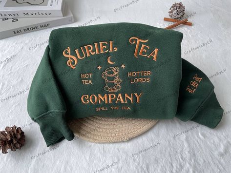 Suriel Tea Company Embroidered Sweatshirt, Acotar Bookish Embroidered, SJM Embroidered Sweatshirt, A Court Of Thorns And Roses Hoodie velaris,Embroidered Valeris,Velars sweatshirt,sjm bookish,acotar sweater,bookish shirt,bookish sweat,suriel tea co,sarah j maas sweat,acotar velaris tee,Embroidered shirt,gift for book lover,suriel tea sweater ❗️Place your ORDER NOW with Exclusive Discount this Week! -------------------------------------------- ❗️PRODUCT DETAILS How to Customize: - Choose your pre Suriel Tea, Acotar Velaris, Tea Company, Court Of Thorns And Roses, Tea Companies, Sarah J Maas, Embroidered Sweatshirt, Sarah J, Embroidered Sweatshirts