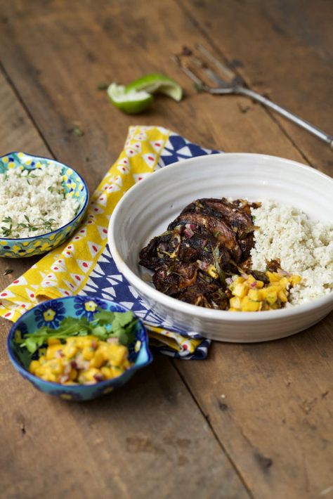 The dish is served on a white bowl on top of a colorful table napkin with some additional mango salsa and cauliflower coconut rice served on the side. Jerk Mushrooms, Health Benefits Of Cauliflower, Cauliflower Benefits, Raw Vegan Dinners, Portabello Mushrooms, Raw Vegan Dinner Recipes, Fresh Mango Salsa, Salsa Ingredients, Mushroom Dish