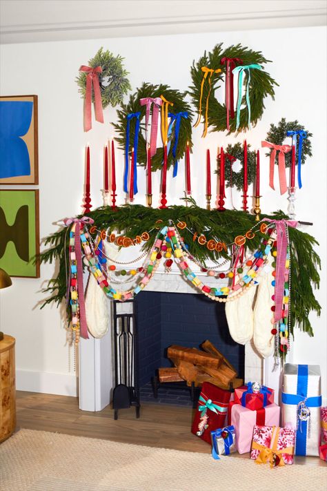 One of our favorite holiday decor ideas is to create a wreath gallery wall. It's a budget-friendly way to decorate above your mantel or fireplace since smaller wreaths are usually cheaper than large oversized ones. Adding cute color bows really completes the maximalist look! #maximalistchristmasmantel #maximalistholiday #whimsicalholiday #bhg Holiday Decor Ideas, Vibrant Decor, Kitsch Christmas, Cindy Lou Who, Holiday Mantel, Christmas Decor Inspiration, Cindy Lou, Christmas Inspo, Holiday House