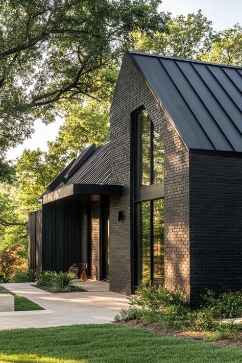 Black Metal Roof Black House, Modern House Brick Exterior, Dutch Architecture Modern, Black Brick Homes Exterior, Charcoal Brick House, Cold Climate House Design, Black And Brick House Exterior, Scandinavian Barndominium, Black Painted Brick Exterior