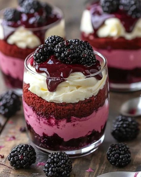 Blackberry Red Velvet Cheesecake Parfait 🍇🍰❤️ Ingredients: - For the Red Velvet Cake Layer: - 1 cup all-purpose flour - 1 tbsp unsweetened cocoa powder - 1/4 tsp baking soda - 1/4 tsp salt - 1/4 cup butter, softened - 1/2 cup granulated sugar - 1 large egg - 1/2 cup buttermilk - 1 tsp vanilla extract - 1 tbsp red food coloring - For the Cheesecake Layer: - 8 oz cream cheese, softened - 1/3 cup powdered sugar - 1 tsp vanilla extract - 1 cup whipped cream - For the Blackberry Sau... Blackberry Parfait, Hosting Era, Cheesecake Parfait, Cheesecake Layer, Parfait Cups, Cheesecake Parfaits, Velvet Cheesecake, Cheesecake Cups, Unsweetened Cocoa Powder