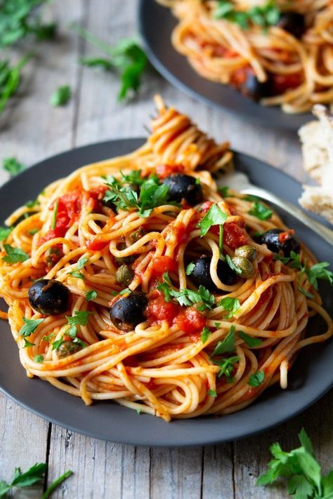 Spaghetti with Puttanesa Sauce. A simple yet flavour packed Italian pasta dish. Made with store cupboard ingredients. Italian Recipes | Authentic Italian recipes | #insidetherustickiktchen #pasta #Italian #Italianfood #tomatoes Italian Pasta Recipes Authentic, Pici Pasta, Spaghetti Vongole, Spaghetti Alla Puttanesca, Puttanesca Sauce, Alla Puttanesca, Sauce Spaghetti, Store Cupboard, Italian Pasta Dishes