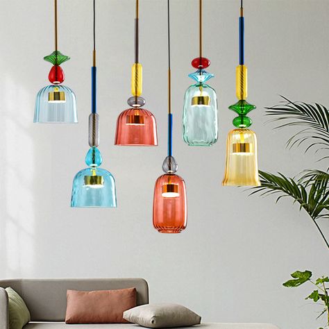 Looking for a unique and stylish way to add a touch of color to your home? Look no further than our mid-century colored glass pendant light. From traditional colors such as blue and green, to more daring hues such as pink and yellow, we have a light to suit your every need. Not only do our lights come in a variety of shapes and sizes, but they also feature minimalist designs that are perfect for any decor. Add a touch of 1960s style to your home today! Vibrant Glamour, Hanging Lamps For Bedroom, Modern Hanging Lamp, Glass Chandeliers, Mid Century Colors, زجاج ملون, Suspension Vintage, Glass Pendant Lamp, Glass Candy