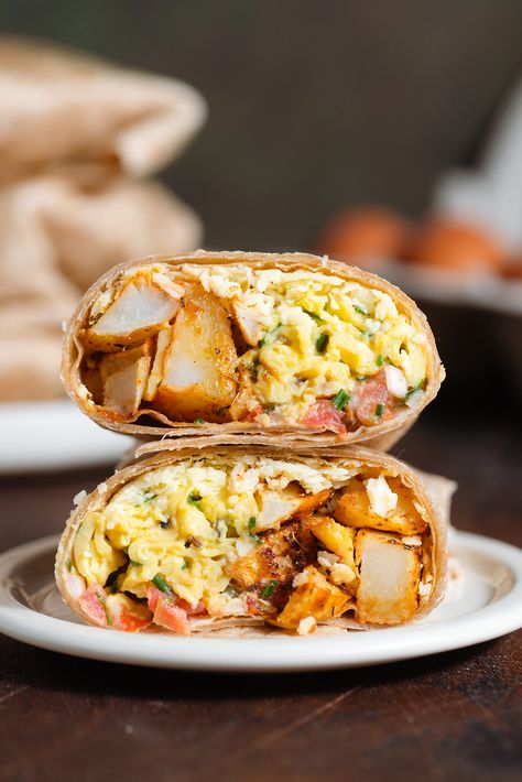 These Breakfast Burritos with Potatoes are really easy to make and freezer-friendly so they're the perfect savory breakfast to make ahead, defrost, and reheat as needed! They're filling, satisfying, healthy, and vegetarian! Sausage Egg Potato Burrito, Breakfast Burritos With Potatoes, Roasted Breakfast Potatoes, Soft Scrambled Eggs, Freezer Breakfast Burritos, Savory Breakfast Recipes, Wheat Tortillas, Breakfast Yummy, Wakey Wakey