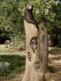 Tree Trunk Sculpture Wood Carvings, Tree Carvings Ideas, Tree Trunk Carvings Chainsaw, Wood Carving Tree Stumps, Carved Tree Stumps Wood Sculpture, Chainsaw Tree Carving, Tree Stump Carvings Chainsaw, Tree Carving Ideas, Stump Carving Ideas