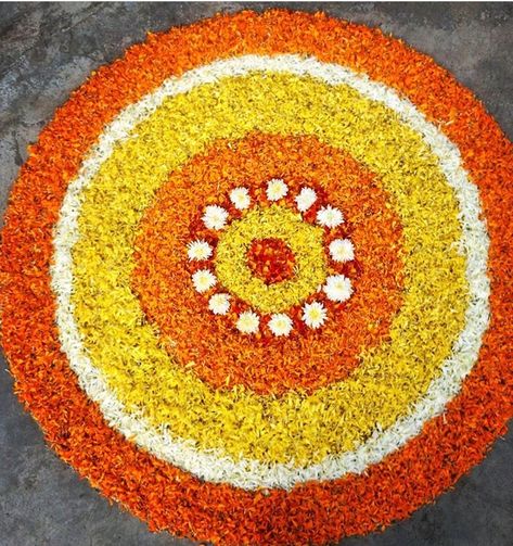 Yellow And Orange Flower Rangoli Easy, Yellow And Orange Flower Rangoli, Haldi Rangoli Designs, Floral Rangoli Designs Flower, Onam Pookalam Design, Onam Pookalam, Pookalam Design, Simple Flower Rangoli, Flowers Garland