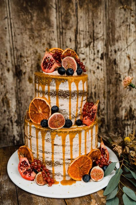 Semi Naked Wedding Cake with Orange Drip and Fig Decor | Autumn Wedding Ideas at Patrick's Barn Styled by Events by Design with Black Wedding Dress, Drip Cake & Pastry Table by Annamarie Stepney Photography Wedding Cake Designs For Fall, Fall Naked Wedding Cake, Black And Orange Wedding Cake, Autumn Cakes Ideas, Autumnal Wedding Dress, Autumn Cakes Ideas Fall, Autumnal Wedding Cake, Fall Naked Cake, Naked Cake Decorating Ideas