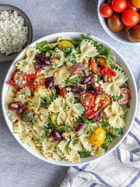 Arugula Pasta Salad - Munchmeals by Janet Pasta Arugula, Arugula Pasta Salad, Pasta Primavera Salad, Salad Arugula, Arugula Pasta, Mediterranean Pasta Salads, Dijon Dressing, Vegan Pasta Salad, Vegan Feta Cheese