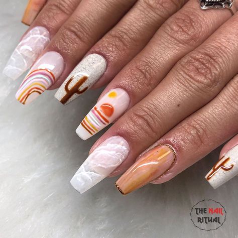 𝙼𝙸𝚈𝙰 𝙰𝙳𝙰𝙼𝚂 on Instagram: “Desert🌵Vibes for @stefykayynails Joshua Tree trip • Using @apresnailofficial medium coffin • • • • • #nailpro #nailsofinstagram #nailswag…” Joshua Tree Nails, Desert Theme Nails, Arizona Inspired Nails, Desert Inspired Nails, Desert Nails Designs, Desert Nail Art, Desert Nails, Arizona Nails, Flashy Nails