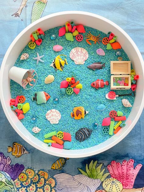 Dried Chickpeas Ocean Sensory Bin - In The Playroom Chickpea Sensory Bin, Shredded Paper Sensory Bin, Sensory Bin Summer, Sensory Tray Ideas, Under The Sea Sensory Bin, Beach Sensory Bin, Summer Sensory Bin, Under The Sea Sensory, Ocean Sensory Bin