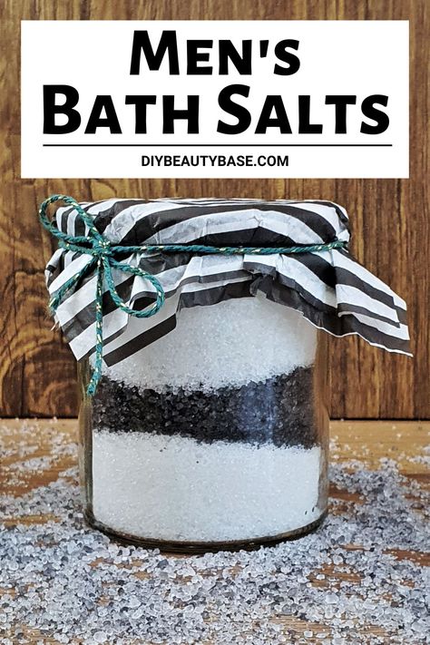 Give the special man in your life the gift of relaxation with this easy and customizable manly bath salts recipe. With a masculine twist on the scent and some black color from cahrcoal, these homemade bath salts for men will make a perfect manly DIY spa gift. Diy Bath Products To Sell, Bath Salt Container Ideas, Diy Spa Basket, Bath Salts Packaging Ideas, Bath Salt Labels, Spa Gift Basket Ideas, Diy Bath Salts With Essential Oils, Bath Salt Recipe, Bath Salts Diy Recipes