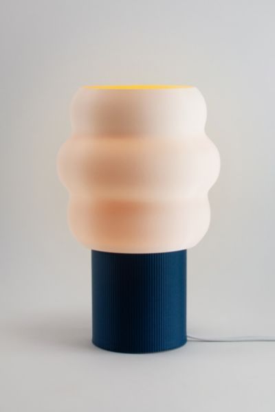 The Jelli Table Lamp finds its creative spark in the playful contours of soft serve ice cream, resulting in a design that’s whimsical and unique. The warm glow will bring happy vibes to any space. The Jelli Table Lamp is a great addition to your working desk or bedside table. The Jelli Table Lamp is designed, 3D printed, and hand assembled by Honey and Ivy Studio in Portland, Oregon. The 3D printing process is similar to making ceramic pottery in that each printed part is unique and has its own Pottery Table Lamp, 3d Printed Lamp Design, 3d Print Lamp, 3d Printed Lamp, Desk Lamp Design, Tulip Vase, Big Light, Working Desk, Serve Ice Cream