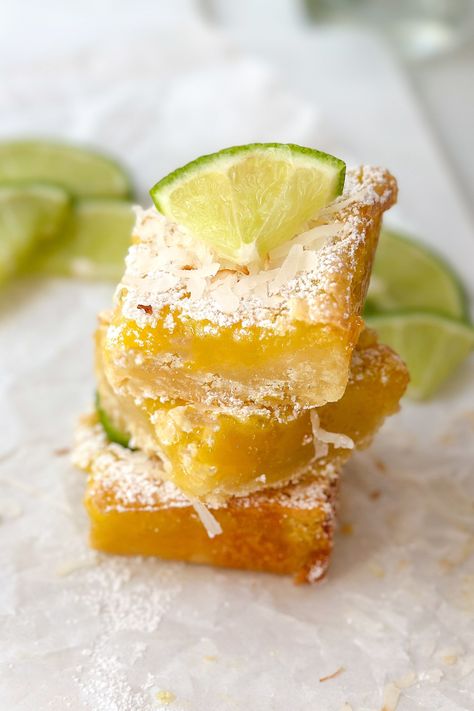 These tropical-inspired coconut lime bars are such a treat. Bright and citrusy with an irresistible flavor, it is perfect whenever you need to bring a dessert or crave the delicious flavor of tangy, sweet limes. And the pairing with coconut? Oh my, it's heavenly! Coconut Lime Bars, Bars With Shortbread Crust, 31 Daily, Tropical Desserts, Fruit Bars, Cook Meals, Lime Bars, Themed Desserts, Shortbread Crust