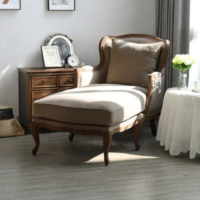 Embrace the classic, enjoy elegance. This vintage chaise lounge carries the mark of time, allowing you to revisit refined living and experience comfort and prestige. Smith Thera Upholstery Color: Beige | Smith Thera Vintage Indoor Chaise Lounge Upholstered Chaise Lounge brownWood in Beige | 36.81" H X 27.17" W X 58.27" L | Wayfair Narrow Chaise Lounge, Cane Chaise Lounge, Antique Reading Chair, Bedroom Chaise Lounge Master Suite, Chairs In Bedroom, Chaise Lounge Reading Nook, Vintage Chaise Lounge, French European Decor, Library Sitting Room