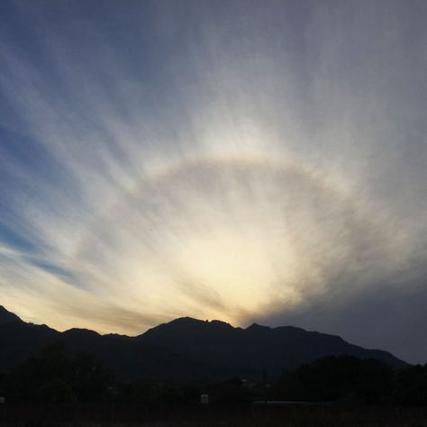 A 22-degree halo formed around the Sun by the ice crystals of Cirrostratus fibratus radiatus cloudsover Alamos, Sonora, Mexico Cirrostratus Clouds, Ice Crystals, The Ice, Stew, Halo, The Sun, Sun, Crystals, Mexico