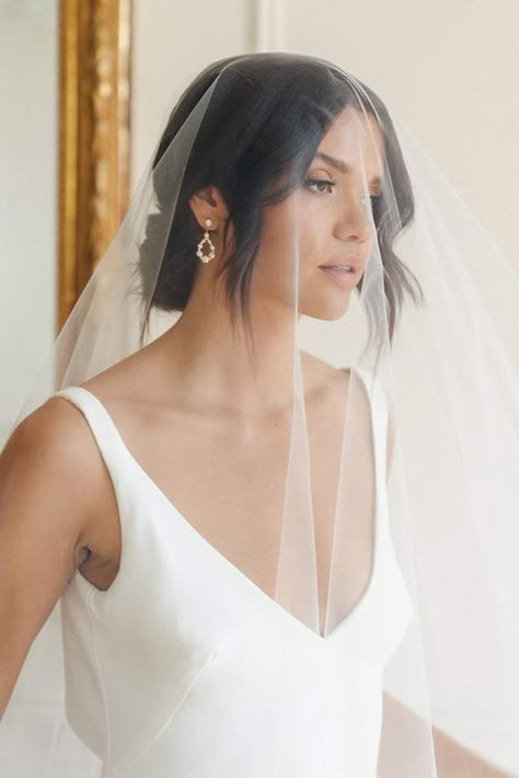 Elegant Wedding Hairstyles 2024: 19 Trends for Women - Bridal Updos, Braids, and More Brides With Veil Over Face, Wedding Veils Plain, Blusher Veil Updo, Front Veil Wedding, Classic Wedding Dress And Veil, Bridal Buns With Veil, Two Tier Veil Over Face, Classic Wedding Accessories, Updo With Blusher Veil