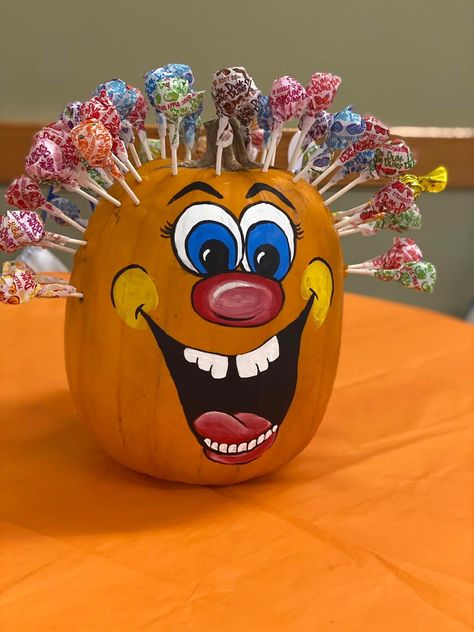 Yellow Pumpkin Decorating Ideas, Skittles Pumpkin Painting Ideas, Monster Pumpkin Decorating, Pumpkin Painting Ideas Garfield, Painted Spider Pumpkin, Preschool Pumpkin Decorating Ideas, Clever Painted Pumpkins, Duck Pumpkin Decorating, Theme Pumpkin Decorating