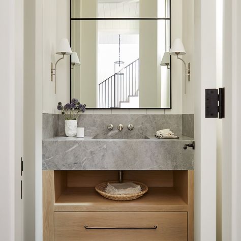 Luxury Bath & Kitchen Project Gallery | Waterworks Natural Powder Bathroom, Transitional Powder Bathroom, Vanity Accent Wall Bathroom, Integrated Sink Powder Room, Vrbo Bathroom Ideas, Porcelain Countertops Bathroom, Powder Room Sink Ideas, Studio Mcgee Powder Room, Powder Room Sinks And Vanities