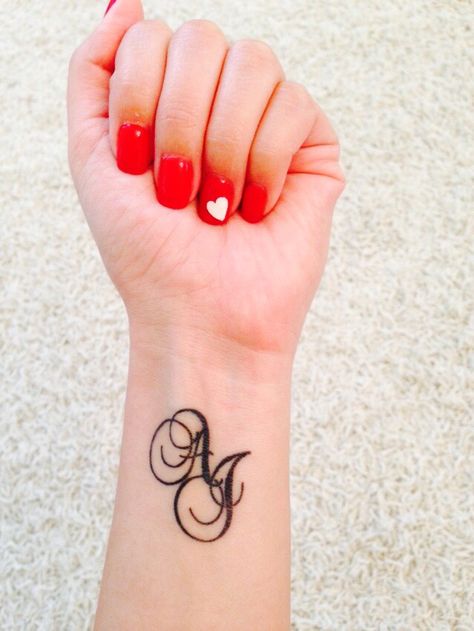 Initials tattoo with script AJ Aj Tattoo Design, Aj Tattoo, Hijab Instagram, Initials Tattoo, Hand Tattoo Images, Tattoo Lettering Styles, Christian Sleeve Tattoo, Tattoo Inspiration Men, Omerta Tattoo